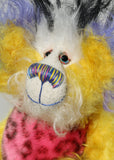Mickey has beautiful, hand painted eyes with eyelids, a splendid nose embroidered from individual threads to complement his colouring and he has a beaming smile. Mickey is stuffed with polyester stuffing and glass beads which give him a little extra weight and make him a little more cuddly. 
