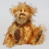 Milo is a sweet and very friendly, one of a kind, artist teddy bear in beautiful tipped mohair by Barbara-Ann Bears  Milo stands 10.5 inches/27 cm tall and he is 8.5 inches/21cm sitting. and is made from a sumptuous, long, very dense, soft and twirly, brown tipped gold mohair with rich brown German wool felt paw pads. 