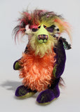Mister Oofaloosy is a wild yet gentle and not so fiery, one of a kind artist honey dragon  by Barbara Ann Bears, he stands 10 inches( 25 cm) tall and is 8 inches (20 cm) sitting. Mister Oofaloosy is made from short purple mohair, long hand dyed mohair in lime, green and yellow and long, pink black and yellow faux fur