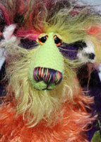 Mister Oofaloosy's face is made from long hand dyed mohair hand dyed lime green, the top of his head and the backs of his ears are a very long, black, pink and yellow faux fur and the fronts of his ears are a short, black spoted white animal print faux fur, he has beautiful, sparkling, hand painted glass eyes with hand coloured eyelids, a beautiful nose embroidered from individual threads to match his colouring and a sweet, enchanting smile