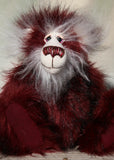 Molly Cuddle a sweet and gentle one of a kind artist bear in stunning burgundy coloured faux fur and gorgeous long fluffy white mohair by Barbara-Ann Bears, she stands 10 inches/25 cm tall and is 7.5 inches/19 cm sitting. Molly Cuddle has beautiful, hand painted eyes with eyelids, a splendid nose embroidered from individual threads and a sweet, friendly smile