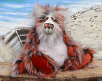 Moritz is a very shaggy, wild and wonderful, one of a kind, artist teddy bear by Barbara-Ann Bears. He's made from gorgeous long, shaggy and dense faux fur which is black at the base with copper and white tipping. Moritz is a large and heavy teddy bear, he stands 18 inches (46 cm) tall and is 14 inches (36 cm) sitting