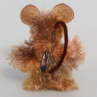 Mouseterpiece is mostly made from a fairly long (very long on a little mouse), feathery sparse mohair that Barbara has dyed in soft browns and his tummy is a denser, curly mohair dyed in shades of beige and blonde. His face is made from a longer mohair dyed in a soft shade of terracotta. The fronts of his ginormous ears are made from a warm beige German wool felt, and the backs a dusky brown.