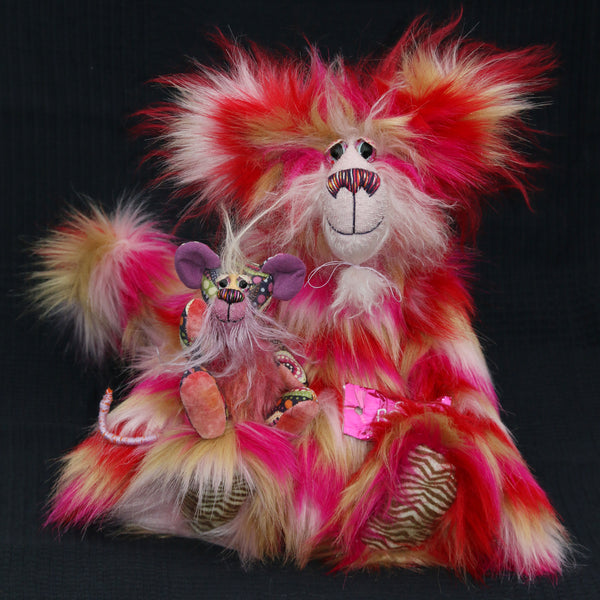Mouski and Katchmouski are a fantastically wild and kooky, one of a kind artist mouse and cat by Barbara Ann Bears Katchmouski stands 12.5 inches( 31 cm) tall and is 11 inches (27 cm) sitting. Mouski stands just 5 inches (12.5 cm) tall and is 4 inches (10 cm) sitting, his tail is 5 inches (12.5 cm) long.