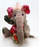 Nellie is a small, friendly and very well behaved, artist elephant made in beautiful chenille, upcycled denim & mohair by Barbara Ann Bears Nellie is number two in an edition of ten, she stands 8 inches( 20 cm) tall, is 6 inches (15 cm) sitting and 4.5 inches (11 cm) across the ears.