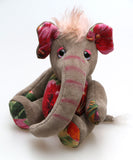 Nellie is a small, friendly and very well behaved, artist elephant made in beautiful chenille, upcycled denim & mohair by Barbara Ann Bears Nellie is number two in an edition of ten, she stands 8 inches( 20 cm) tall, is 6 inches (15 cm) sitting and 4.5 inches (11 cm) across the ears.