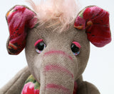 Nellie is a small, friendly and very well behaved, artist elephant made in beautiful chenille, upcycled denim & mohair by Barbara Ann Bears Nellie is number two in an edition of ten, she stands 8 inches( 20 cm) tall, is 6 inches (15 cm) sitting and 4.5 inches (11 cm) across the ears.