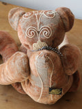 Ole Gravelbelly is a a saggy, loveable and folksy teddy bear made in a beautifully embroidered vintage German mohair by Barbara Ann Bears. Ole Gravelbelly is 21.5 inches (38cm) tall and is 14 inches (35cm) sitting, 12 inches (30cm) slouching. Ole Gravelbelly is a very saggy bear with bucketfuls of character