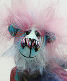 Ozzy is a comically sweet and dinky, one of a kind, artist bear in beautiful printed fabric and hand dyed mohair by Barbara-Ann Bears, he stands just 6.25 inches (16 cm) tall and is 5 inches (12.5 cm) sitting, this doesn't include his beautiful shock of pink hair which adds another 2.5 inches (6.5 cm) to these measurements.