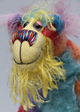 Pedro, a comical, lanky, rainbow bear, a one of a kind artist bear in the most gorgeous, colourful hand-dyed mohair by Barbara Ann Bears Pedro stands 15.5 inches( 39 cm) tall and is 12 inches (30 cm) sitting, just the sort of teddy bear that you might expect to find at the end of a rainbow. 