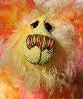 Peggy Smiles is a joyous celebration of colourful happiness, a one of a kind, hand dyed mohair artist bear by Barbara-Ann Bears. Peggy Smiles stands 9 inches( 23 cm) tall and is 7 inches (18 cm) sitting.