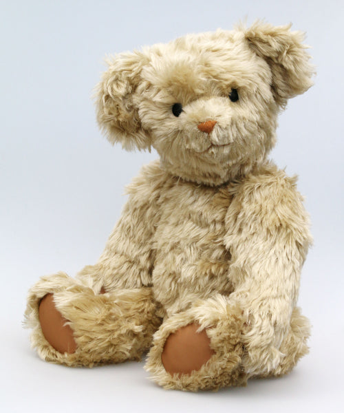 Percy is quite a large bear, he's 22 inches (56 cm) tall and is 16 inches (41 cm) sitting.Percy is made from a beautiful beige, slightly distressed English mohair which reveals a hint of green in certain lights. Percy has tan leather paw pads and vintage boot buttons for eyes