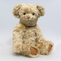 Percy is quite a large bear, he's 22 inches (56 cm) tall and is 16 inches (41 cm) sitting.Percy is made from a beautiful beige, slightly distressed English mohair which reveals a hint of green in certain lights. Percy has tan leather paw pads and vintage boot buttons for eyes