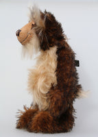 Philoneus Tomsk is a very handsome and dignified, one of a kind, artist bear by Barbara-Ann Bears, he stands 17.5 inches(45 cm) tall and is 13 inches(33 cm) sitting. He is made a long and fluffy, tousled, medium brown mohair with black tipping, contrasting with a fluffy pale cream mohair with a warmer beige backcloth