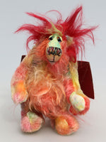 Pinatubo is a very friendly gently colourful and not so fiery one of a kind artist dragon in beautiful hand dyed mohair by Barbara Ann Bears Pinatubo stands 8 inches( 20 cm) tall and is 6.5 inches (16 cm) sitting, this doesn't include his plume of wildly fluffy hair which add an extra 2.5 inches (6 cm). 