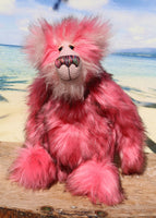 Pink Plink Fizz is an exceedingly cuddly, pink and fluffy, one of a kind, artist bear by Barbara-Ann Bears in luxurious mohair and faux fur, he stands 15 inches (38 cm) tall and is 12 inches (30 cm) sitting. He is made from a long, dense and soft faux fur which is a very strong pink with subtle black tipping. 