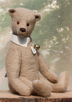Pomeroy a large and elegant classical, one of a kind, traditional mohair artist teddy bear by Barbara Ann Bears. He stands 23.5 inches (60 cm) tall and is made from gorgeous dense and curly beige mohair with beige suedette paw pads, old amber glass eyes, an impressive embroidered brown nose and the sweetest smile
