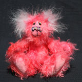 Poppy Blueskies is a sweet, fun-loving and very pink, one of a kind, hand dyed mohair artist teddy bear by Barbara-Ann Bears with blue ears, she stands 8.5 inches (21 cm) tall and is 6.5 inches (16 cm) sitting. Poppy Blueskies is mostly made from a piece long wildly distressed mohair dyed a warm candy-floss pink