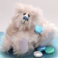 Quinn is a small yet mighty, adorable snowbear, a one of a kind artist bear in fluffy, scrumptious snowy mohair by Barbara-Ann Bears Quinn stands 7.5 inches (19 cm) tall and is 5.5 inches (13 cm) sitting.