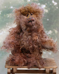 Rambling Joe is a wild and fluffy one of a kind, hand dyed mohair artist bear by Barbara-Ann Bears, he stands 10.5 inches (26 cm) tall and is 8 inches (20 cm) sitting. Rambling Joe is made from a gorgeous, long, wildly tousled mohair that Barbara has dyed in many soft, natural shades of brown