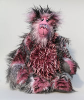 Raphael is a strikingly handsome one of a kind artist teddy bear in gorgeous pink and black mohair and faux fur by Barbara Ann Bears Raphael stands 15.5 inches( 39 cm) tall and is 13 inches (33 cm) sitting. Raphael is a striking bear, a bear of deep pinks, rich silvers and unfathomable black,