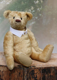 Robin is a large, traditional one of a kind, artist teddy bear in honey gold vintage mohair by Barbara Ann Bears with an Edwardian collar, he stands 21 inches (53 cm) tall and is 15 inches (39 cm) sitting. Robin is made from a beautiful vintage mohair car rug, which we think dates back to the 1920s or 30s