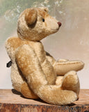 Robin is quite a large bear, he's 21 inches (53 cm) tall and is 15 inches (39 cm) sitting.  Robin is a wonderful, friendly traditional teddy bear. He has an aura of calm and serenity, he's completely unflappable, in any crisis he'll just sit and watch everyone rushing around him, of course that's what all teddy bears do, waiting for everything to calm down and it's time for a good hugging.