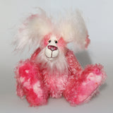 Rosie Rabbit is a very sweet and gentle, one of a kind mohair rabbit by Barbara Ann Bears, she stands 12 inches/30 cm tall and is 8.5 inches/21 cm sitting, her ears are 9 inches/23 cm across the top. Made from beautiful hand dyed pink mohair with long fluffy white mohair used for her face, her ears and her tail
