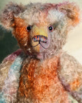 Rowan is a beautiful traditional bear made from delicately coloured hand dyed mohair, he has glass eyes which were painted to match his mohair, a beautiful nose carefully embroidered with individual threads to also match his colouring and a content and gracious expression.