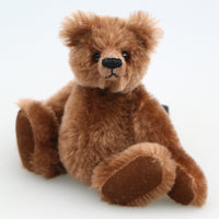 Rudyard is a sweet and gentle, one of a kind, traditional artist teddy bear made from beautiful brown German mohair by Barbara-Ann Bears, he stands just 6 inches (15cm) tall and is 5 inches (13cm) sitting. He has black glass eyes, brown German wool felt paw pads a pert, little brown nose and a gentle smile