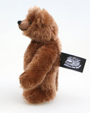 Rudyard is a sweet and gentle, one of a kind, traditional artist teddy bear made from beautiful brown German mohair by Barbara-Ann Bears, he stands just 6 inches (15cm) tall and is 5 inches (13cm) sitting. He has black glass eyes, brown German wool felt paw pads a pert, little brown nose and a gentle smile