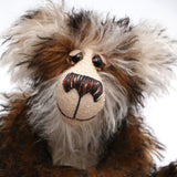 Russel Ruffletoff is a charming and handsome, one of a kind, artist bear by Barbara-Ann Bears in wonderful fluffy tipped mohair Russel Ruffletoff stands 11.5 inches(29 cm) tall and is 9 inches(23 cm) sitting. 