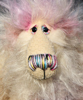 Sammy Snuggles is a very sweet and happy one of a kind artist bear made from faux fur and hand dyed mohair by Barbara Ann Bears. Sammy Snuggles stands just 6.25 inches( 15 cm) tall and is 5 inches (13 cm) sitting, this doesn't include his plume of wildly fluffy hair which adds an extra 2.5 inches (6 cm).