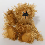 Sid Scruffball is a very sweet and happy very fluffy brown mohair artist bear by Barbara Ann Bears, he stands 8.5 inches/21 cm tall and is 6.5 inches/17 cm sitting. Sid is made from a very long and fluffy coffee brown mohair with brown wool felt paw pads, hand painted eyes with eyelids and a huge nose and smile