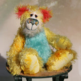 Sigmund Sunbundle stands 12 inches( 30 cm) tall and is 9.5 inches ( 24 cm) sitting. Sigmund Sunbundle is exceedingly cheerful and wonderfully colourful. A bear full of sunshine and happiness, as if all the summer sunshine had been bundled up and moulded into a teddy bear, he wants to make summer last all year. 