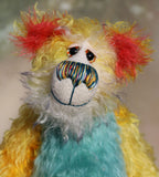 Sigmund Sunbundle stands 12 inches( 30 cm) tall and is 9.5 inches ( 24 cm) sitting. Sigmund Sunbundle is exceedingly cheerful and wonderfully colourful. A bear full of sunshine and happiness, as if all the summer sunshine had been bundled up and moulded into a teddy bear, he wants to make summer last all year. 