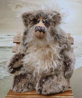 Sir Cadbury Fluffybum is a very sweet and cuddly, one of a kind, artist teddy bear in gorgeous faux fur and mohair by Barbara-Ann Bears. Sir Cadbury Fluffybum stands 14 inches (35 cm) tall and is 11 inches (28 cm) sitting. 