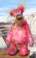 Snazzie Jones is a beautifully coloured, elegant yet kooky, pinkish, one of a kind artist bear in hand dyed mohair by Barbara Ann Bears Snazzie Jones stands 13 inches( 33 cm) tall and is 10 inches (25 cm) sitting. Snazzie Jones is a sweet and colourful girl. She is a warm and loving soul in need of someone to love, everybody needs somebody to love.