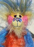 Sparky McTickle has beautiful, hand painted glass eyes with hand coloured eyelids, a splendid nose embroidered from individual threads to compliment his colouring and he has a huge, friendly smile. 