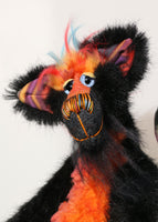 Spooky Norman is very friendly, if fiendishly spooky, one of a kind artist cat in hand-dyed silk, viscose and faux fur by Barbara Ann Bears Spooky Norman stands 12.5 inches( 31 cm) tall and is 11 inches (27 cm) sitting, his curly tail would be about 13 inches (33 cm) long. Spooky Norman is a rather unconventional cat