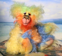 Spritzer is a very happy and sweet teddy bear, a gloriously colourful, one of a kind, hand-dyed mohair artist bear by Barbara-Ann Bears Spritzer stands just 7.5 inches( 19 cm) tall and is 6 inches ( 15 cm) sitting. Spritzer is a mixture of beautiful happy, springtime colours, like pretty flowers and blue skies