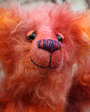 Sprocket is an endearingly comical and undemanding one of a kind artist bear made from hand dyed mohair and faux fur by Barbara Ann Bears, he stands 13 inches( 33 cm) tall and is 10.5 inches (27 cm) sitting. He's mostly made from a long and tousled mohair that Barbara has dyed in purple, pink, peach and orange