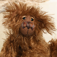 Thingummy Bob is a wild thing, yet a very friendly wild thing, a one of a kind, artist bear by Barbara-Ann Bears in wonderful shaggy mohair, Thingummy Bob stands 10 inches (25 cm) tall and is 7.5 inches (19 cm) sitting. Thingummy Bob is a bear of wonderful woodland colours with the warmest and most loving of personalities.