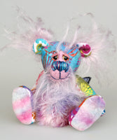 Tim Tickletum is made from a beautiful, cotton fabric printed with a batik design in blue, turquoise, rose and pink. His face and the backs of his ears are a long wispy dusky pink mohair and his tummy and the underside of his tail are a shorter, denser mohair in blue, purple and violet. Tim has hand dyed, velvet paw pads. Tim Tickletum has beautiful hand painted eyes with hand coloured eyelids, an intricately embroidered nose sewn from individual threads and a broad, sweet smile