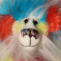 Timmy Tickle Toes has beautiful, hand painted eyes with eyelids, a splendid nose embroidered from individual threads to compliment his colouring and he has a huge, friendly smile.