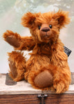 Timothy Tucker is a very sweet and charming, one of a kind artist teddy bear by Barbara Ann Bears in gorgeous English mohair, like a young bear cub. He stands 10.5 inches/26 cm tall and is 8 inches/20 cm sitting. Timothy Tucker is made from a beautiful, dense, distressed, warm cinnamon coloured English mohair