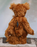 Timothy Tucker is a very sweet and charming, one of a kind artist teddy bear by Barbara Ann Bears in gorgeous English mohair, like a young bear cub. He stands 10.5 inches/26 cm tall and is 8 inches/20 cm sitting. Timothy Tucker is made from a beautiful, dense, distressed, warm cinnamon coloured English mohair