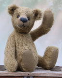Toby Tumble is a very sweet and friendly, almost traditional, one of a kind, mohair artist teddy bear by Barbara Ann Bears. He stands 10 inches/25 cm tall and is 7.5 inches/19 cm sitting.  is made from a beautiful, quite sparse, straight pile, soft greeny-brown mohair, it's colour is a bit like an old army tunic 