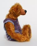 Tom Barleycorn is a mohair teddy bear in a swimsuit by Barbara Ann Bears