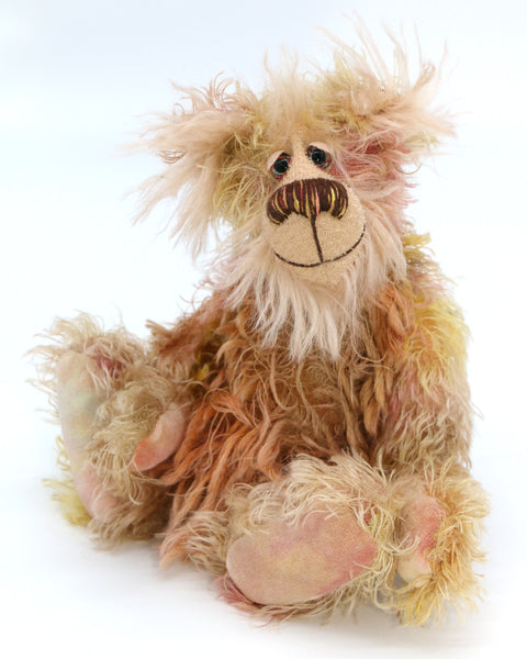 Tom Duchart is a wild, raggedy and lovable one of a kind artist bear by Barbara-Ann Bears in hand-dyed mohair, he stands 11 inches/28 cm tall and is 8.5 inches/22cm sitting. Tom Duchart is a very friendly bear with a somewhat nonplussed expression made in distressed mohair dyed in shades of beige, rose, ochre and brown